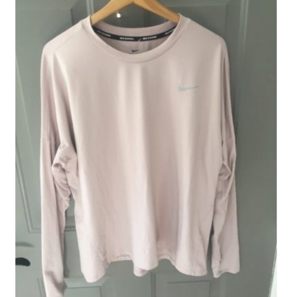 blush pink nike shirt